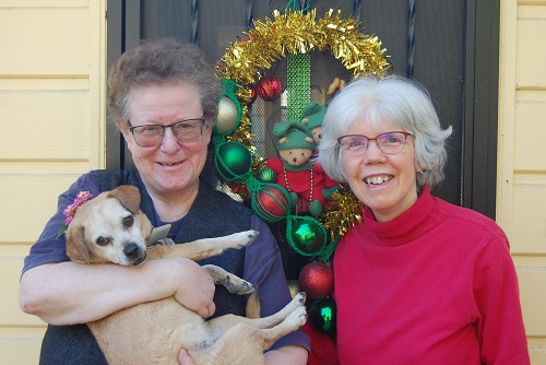 Kittredge Cherry and Audrey Lockwood Christmas with dog 2021 